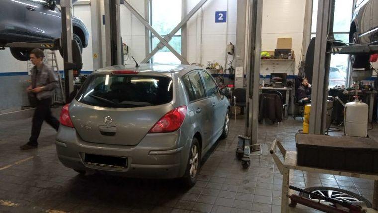 Nissan Tiida,  - вид 2